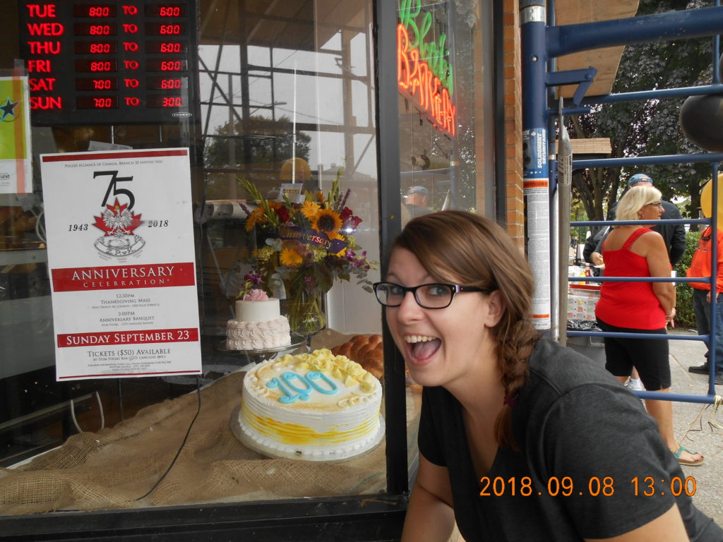 Miss Julie Gill-Blak at the front of the store.